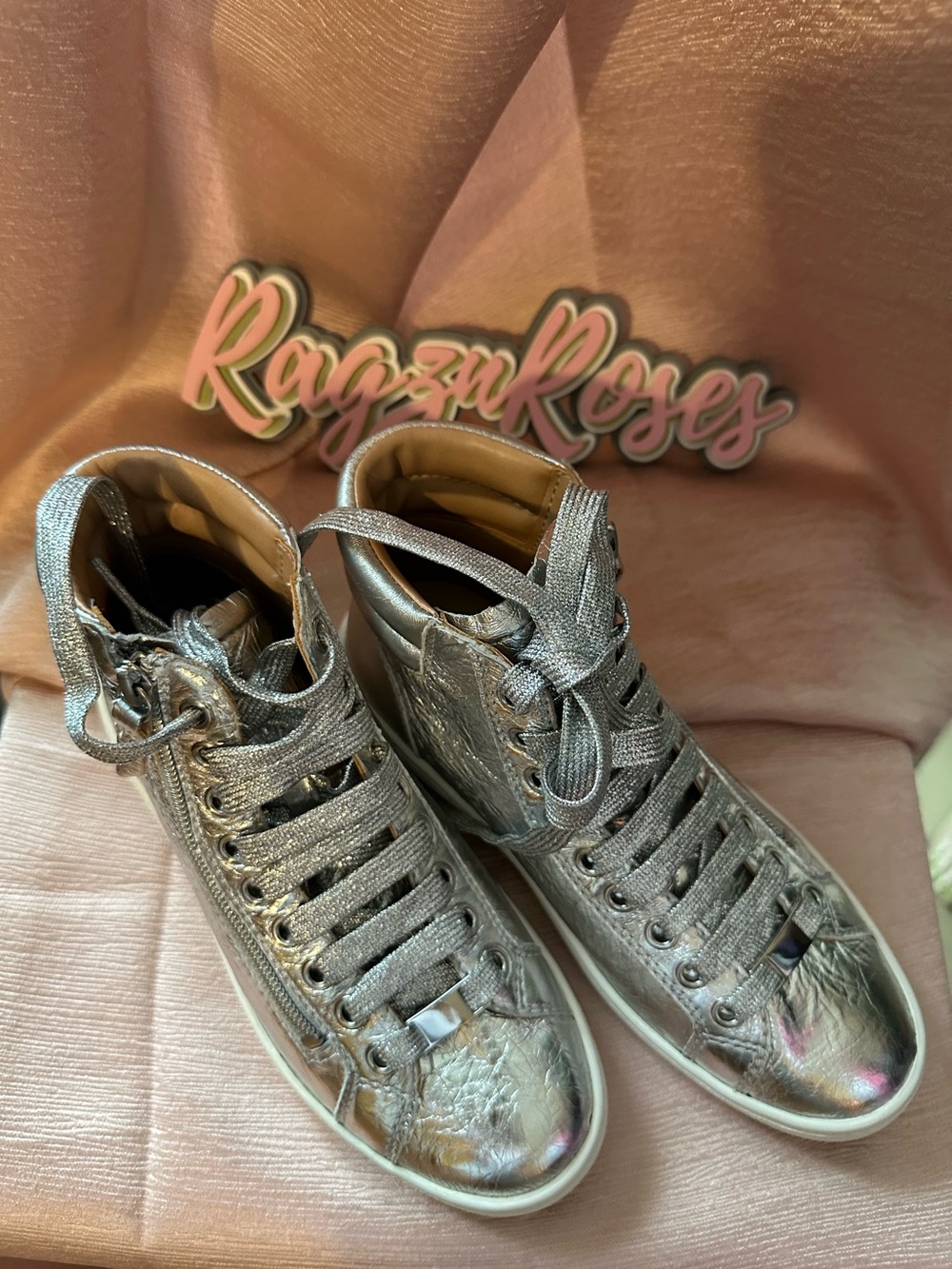 NWB! UGG Olive sneakers in a metallic silver crinkle leather finish.